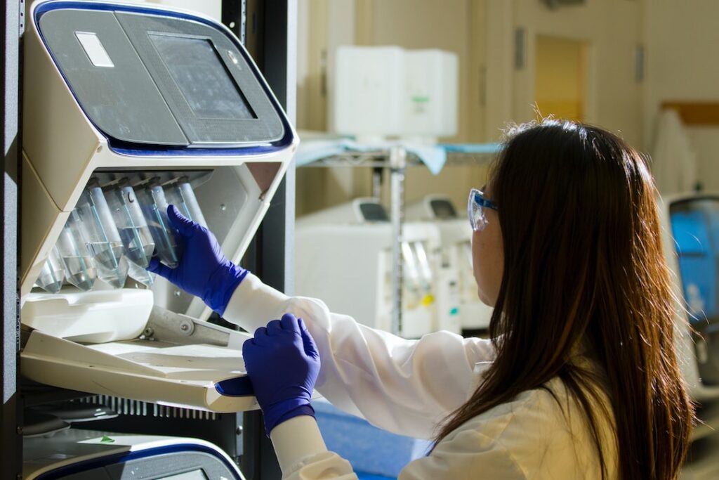 DNA Genotyping and Sequencing. Technician prepares for a viral whole-genome sequencing experiment at the Cancer Genomics Research Laboratory, part of the National Cancer Institute's Division of Cancer Epidemiology and Genetics (DCEG).